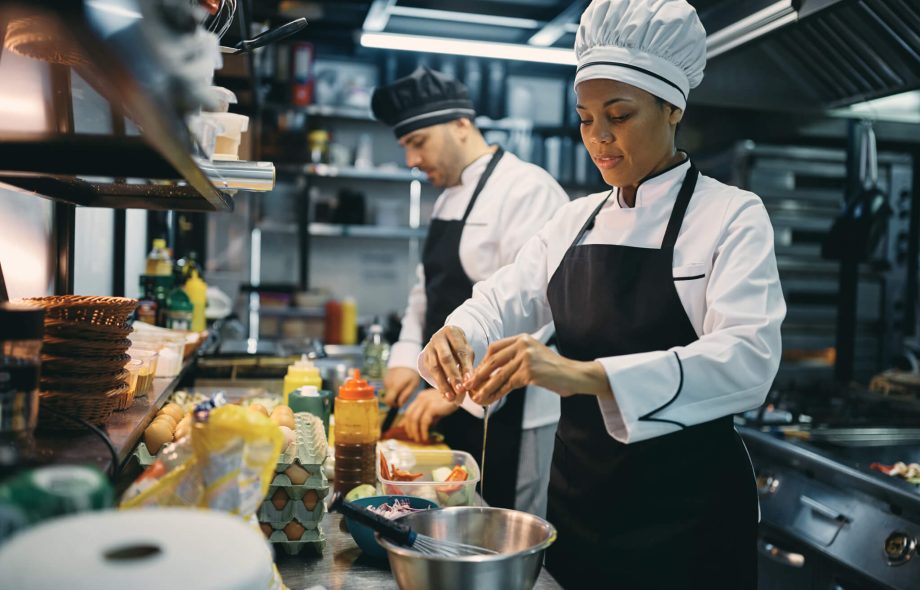 Crew working at culinary workstation