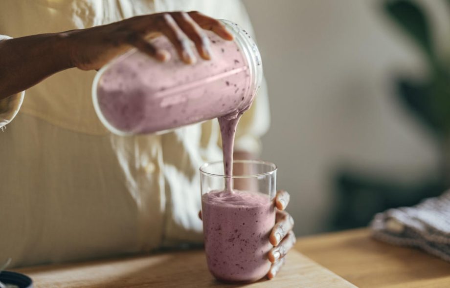 Woman making milkshake