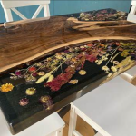 Need a little flair in your kitchen, hallway, or even your bathroom? Don’t underestimate the power of an epoxy resin stools. These aren’t your average seats; they’re miniature sculptures blending wood’s natural beauty with eye-catching epoxy finishes.